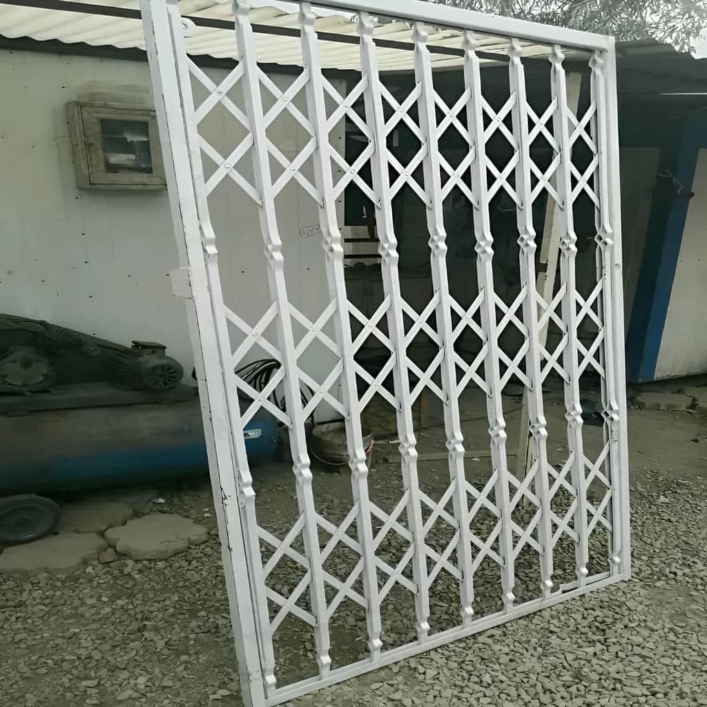 قیمت حفاظ پشت درب آکاردئونی سه گل در فردیس کرج