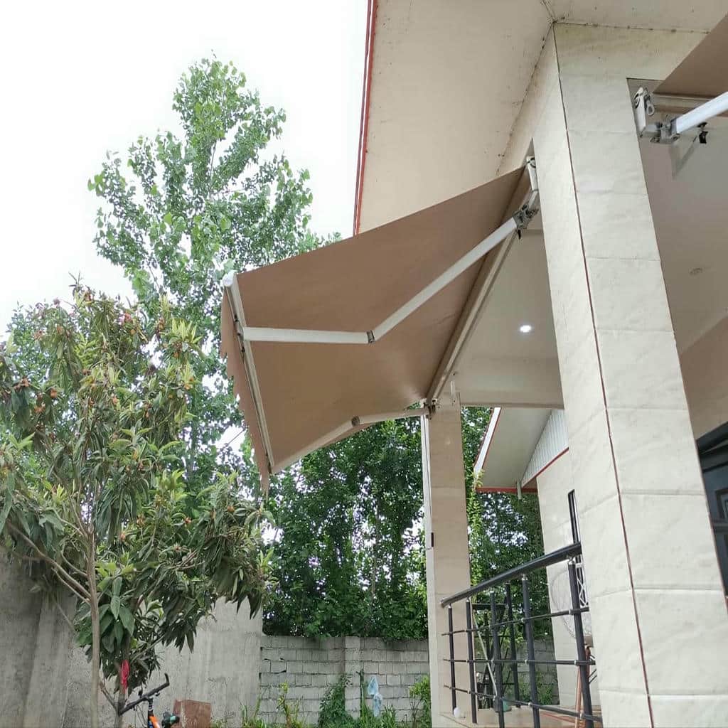 قیمت سایبان برقی اتوماتیک پارچه ضدآب و UV در کرمان