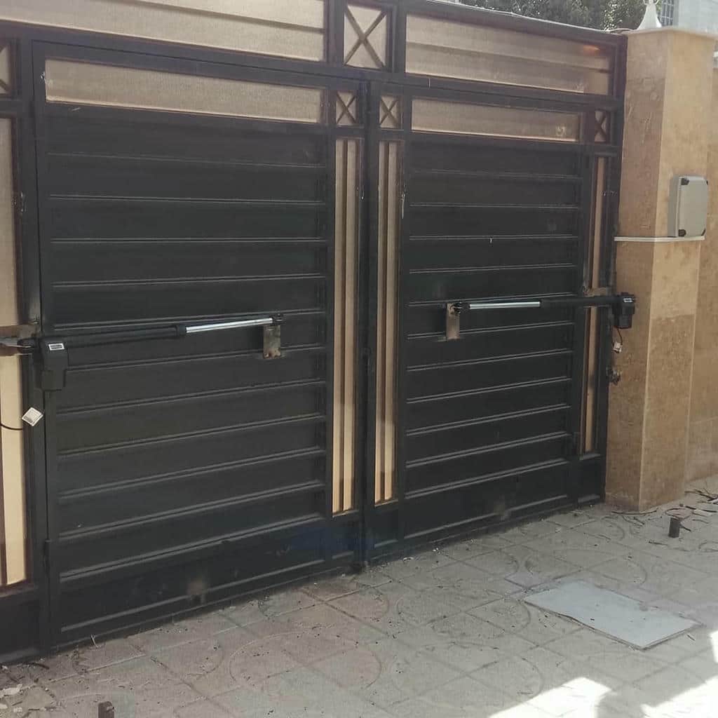 نصب جک درب پارکینگ اتوماتیک ریموتی در لواسان