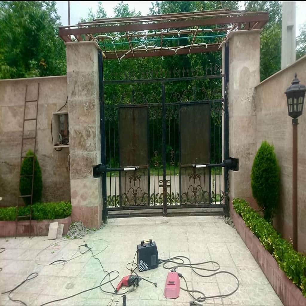 نصب جک درب پارکینگ اتوماتیک پوشش ضدزنگ در ایرانشهر
