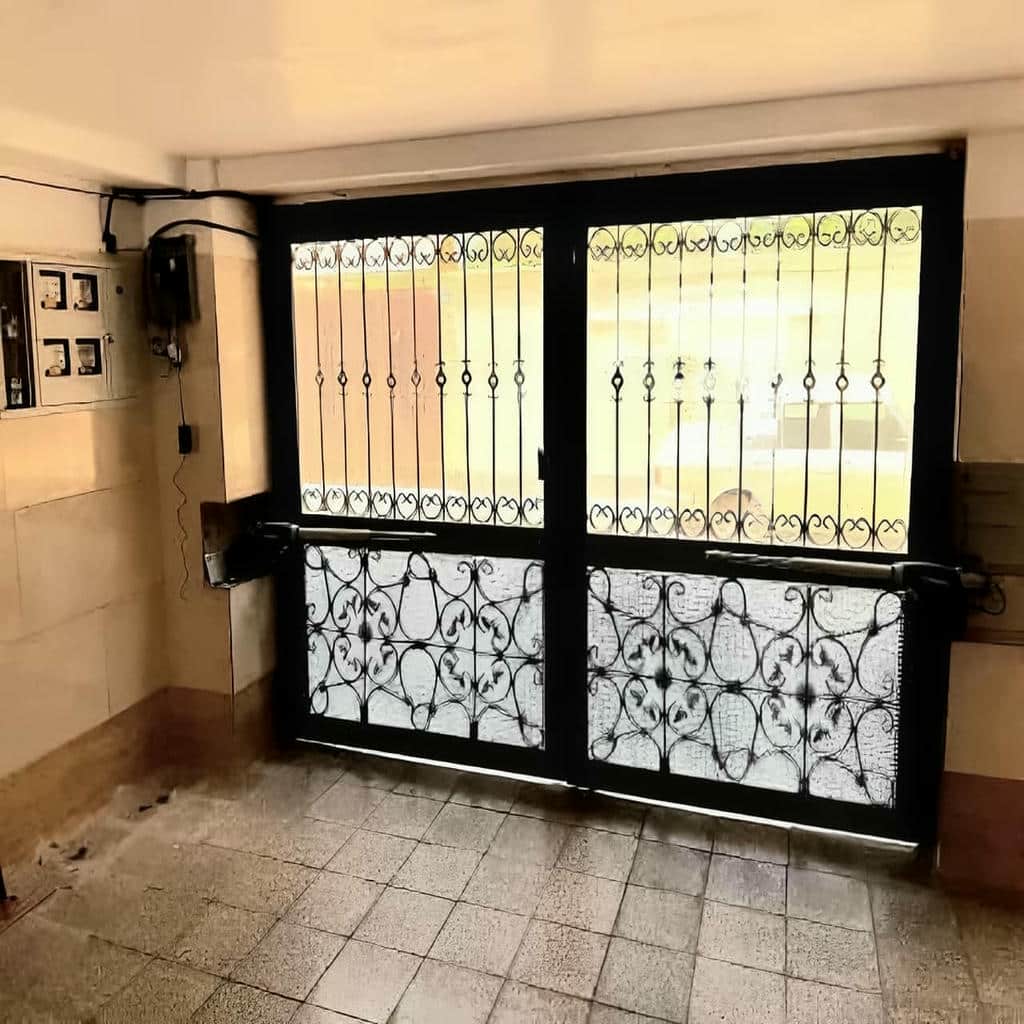نصب جک درب پارکینگ اتوماتیک سنسوردار در سیرجان