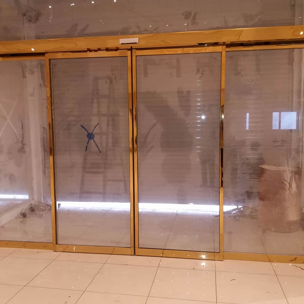 سفارش درب اتوماتیک شیشه ای اداری کارتخوان با قفل الکتریکی