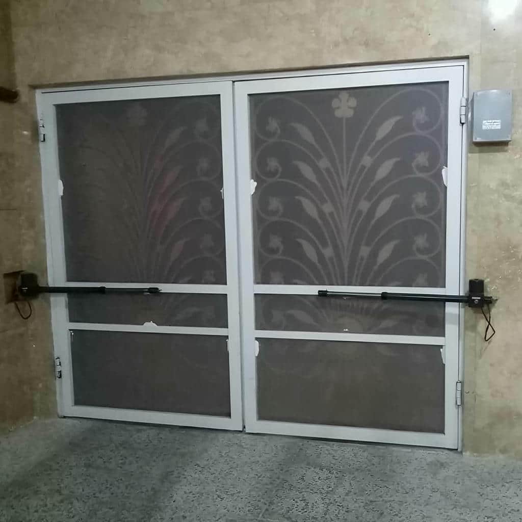 اجرای جک درب پارکینگ الکترومکانیک خانگی با حرکت نرم