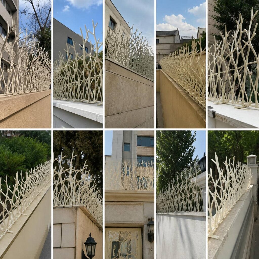 نرده سرنیزه ای خاکستری روی دیوار سیمانی